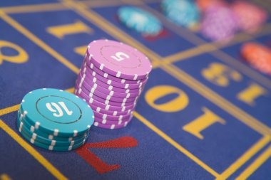 Live dealer spinning American Roulette wheel Live dealer spinning American Roulette wheel